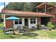 Relaxing backyard with a patio, seating area, and lush green landscape at 3655 N Scenic Hwy, Lake Wales, FL 33898