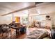 Unfinished basement with bare floor, exposed ceiling, and a collection of stored items at 3655 N Scenic Hwy, Lake Wales, FL 33898