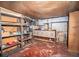 Unfinished basement with concrete floor and unfinished walls, offering storage space and potential for renovation at 3655 N Scenic Hwy, Lake Wales, FL 33898