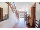 Inviting foyer features hardwood floors, staircase, and natural light from the entry door at 3655 N Scenic Hwy, Lake Wales, FL 33898