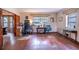 Bright home office with two desks, hardwood floors, and natural light from two windows at 3655 N Scenic Hwy, Lake Wales, FL 33898