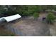 Fenced horse pen with a dark horse offering space for equestrian activities and a small shelter at 3655 N Scenic Hwy, Lake Wales, FL 33898