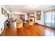 Expansive living room featuring hardwood floors, fireplace, and abundant natural light at 3655 N Scenic Hwy, Lake Wales, FL 33898