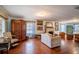 Bright living room with hardwood floors, a fireplace, and vintage furniture at 3655 N Scenic Hwy, Lake Wales, FL 33898
