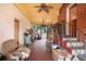 Covered back porch with brick accents, offering a view of the backyard at 3655 N Scenic Hwy, Lake Wales, FL 33898