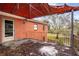 Open rooftop deck featuring brick accents and a metal railing, perfect for enjoying outdoor views and sunshine at 3655 N Scenic Hwy, Lake Wales, FL 33898