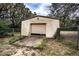 A one-car garage with concrete slab foundation needing repair at 3655 N Scenic Hwy, Lake Wales, FL 33898