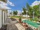Wide backyard with grass, plants, and perimeter fencing at 3690 Wellington Pl, Bartow, FL 33830