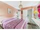 Inviting bedroom with soft tones, a mirrored dresser, and a closet at 3690 Wellington Pl, Bartow, FL 33830