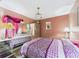 Bedroom with ample natural light, mirrored vanity and decorative accents at 3690 Wellington Pl, Bartow, FL 33830