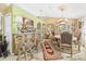 Formal dining room featuring elegant decor, chandelier, and decorative accents at 3690 Wellington Pl, Bartow, FL 33830
