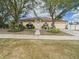 Charming home with inviting front entrance and lush landscaping for curb appeal at 3690 Wellington Pl, Bartow, FL 33830