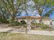 Charming home with inviting front entrance and lush landscaping for curb appeal at 3690 Wellington Pl, Bartow, FL 33830