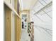 Hallway with visible framing, wire racks, and utility access at 3690 Wellington Pl, Bartow, FL 33830