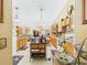 Bright and open kitchen offering plentiful cabinetry, granite countertops, and an island at 3690 Wellington Pl, Bartow, FL 33830