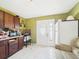 Traditional kitchen with door to outside at 3690 Wellington Pl, Bartow, FL 33830