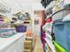 Laundry room with shelving offering plenty of space for storing supplies and linens at 3690 Wellington Pl, Bartow, FL 33830