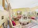 Cozy living room showcasing decorative furniture, artwork, and elegant accents at 3690 Wellington Pl, Bartow, FL 33830