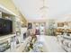 Inviting living room featuring tile floors, a fireplace, and a glass coffee table at 3690 Wellington Pl, Bartow, FL 33830