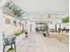 Large covered patio is perfect for outdoor dining and entertaining guests at 3690 Wellington Pl, Bartow, FL 33830