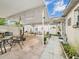 Large covered patio is perfect for outdoor dining and entertaining guests at 3690 Wellington Pl, Bartow, FL 33830