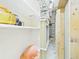 Storage area featuring open shelving and visible framing at 3690 Wellington Pl, Bartow, FL 33830