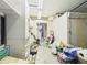 Spacious storage room with open shelving, concrete floors, providing practical organization solutions and ample space at 3690 Wellington Pl, Bartow, FL 33830