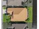 Overhead shot of home with mature landscaping and easy access to waterfront at 4115 Muirfield Loop, Lake Wales, FL 33859
