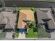 Birds-eye view of a well-maintained home and yard with defined property lines at 4115 Muirfield Loop, Lake Wales, FL 33859