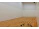 Spacious squash court with marked lines, wooden floors, and rackets ready for a game at 4115 Muirfield Loop, Lake Wales, FL 33859