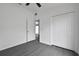 Comfortable bedroom with sleek floors and a closet at 412 Savanna Pointe St, Winter Haven, FL 33884