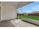 Covered patio with a view of the expansive, well-maintained backyard and fence at 412 Savanna Pointe St, Winter Haven, FL 33884