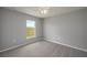 This bedroom offers neutral tones and a ceiling fan at 42 Mountain Dr, Babson Park, FL 33827