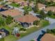 Lovely home with a screened-in lanai surrounded by lush landscaping and a well-manicured lawn at 4232 Roebelenii Dr, Lake Wales, FL 33859
