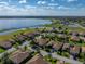 Beautiful aerial shot of homes near a body of water, with lush landscaping and scenic surroundings at 4232 Roebelenii Dr, Lake Wales, FL 33859