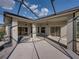 Large covered patio with ceiling fans, offering a relaxing outdoor living space at 4232 Roebelenii Dr, Lake Wales, FL 33859