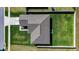 Aerial view of a single-Gathering house with a well-manicured lawn and landscaping at 447 Lanham Dr, Winter Haven, FL 33881