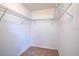 Walk-in closet featuring metal shelving for organized storage solutions at 447 Lanham Dr, Winter Haven, FL 33881