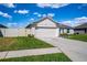 Charming single-Gathering home with a two-car garage and well-kept lawn at 447 Lanham Dr, Winter Haven, FL 33881