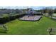 Neighborhood playground featuring a slide, swings, green space, and benches at 447 Lanham Dr, Winter Haven, FL 33881