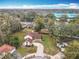 Aerial shot of the property, highlighting the trees and proximity to local architecture at 4765 Lantern Ct, Orlando, FL 32808