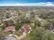 An aerial view of the property and surrounding neighborhood highlighting the landscape and street layout at 4765 Lantern Ct, Orlando, FL 32808