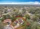 An aerial shot of the outlined property, displaying yard, landscaping and local architecture at 4765 Lantern Ct, Orlando, FL 32808