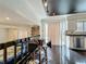 Bright dining area with barstool seating overlooking the living room and backyard views at 4765 Lantern Ct, Orlando, FL 32808