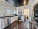 Updated kitchen featuring stainless steel appliances, undermount sink, and contrasting black ceiling at 4765 Lantern Ct, Orlando, FL 32808