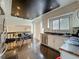 This bright kitchen features stainless steel appliances, undermount sink, and black ceiling at 4765 Lantern Ct, Orlando, FL 32808