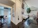 Bright living room boasts vaulted ceilings, striking black tile floors, and artistic decor at 4765 Lantern Ct, Orlando, FL 32808