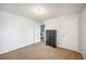 Neutrally decorated bedroom with carpeting and plenty of room to relax and unwind at 5115 Woodgreen Ln, Lakeland, FL 33811