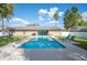 Inviting backyard pool with lounge chairs, providing a perfect oasis for relaxation and outdoor enjoyment at 5115 Woodgreen Ln, Lakeland, FL 33811
