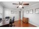This home office features wood floors, a window view and a light gray painted wall at 513 Kelsey St # 513, Lakeland, FL 33803